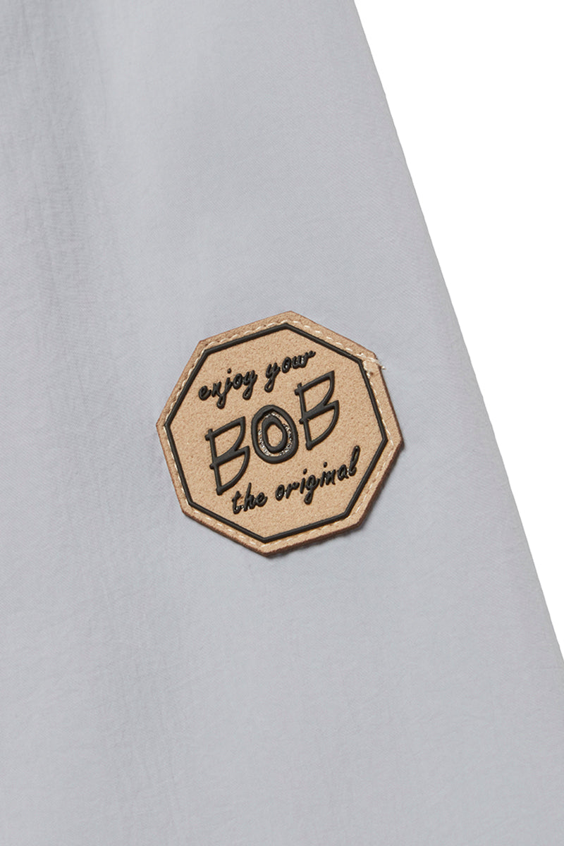 NORWICHI6 パッカブルリバーシブルナイロンコート / AVIO・CORDA スチールブルー・キナリ