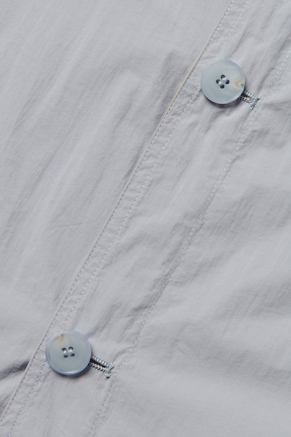 NORWICHI6 パッカブルリバーシブルナイロンコート / AVIO・CORDA スチールブルー・キナリ