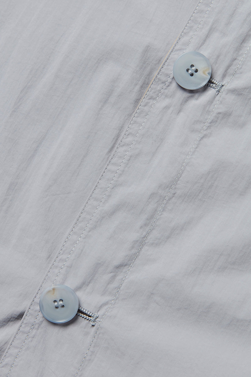 NORWICHI6 パッカブルリバーシブルナイロンコート / AVIO・CORDA スチールブルー・キナリ