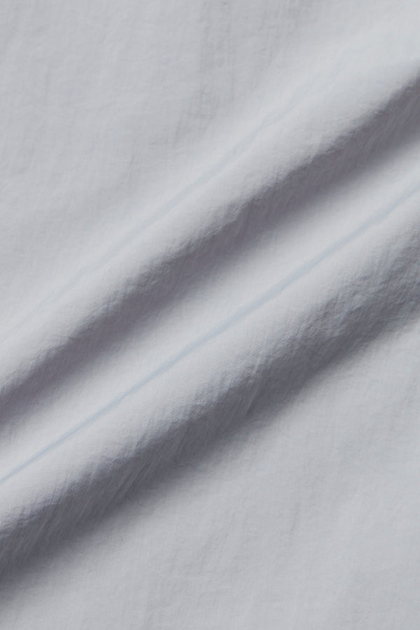 NORWICHI6 パッカブルリバーシブルナイロンコート / AVIO・CORDA スチールブルー・キナリ